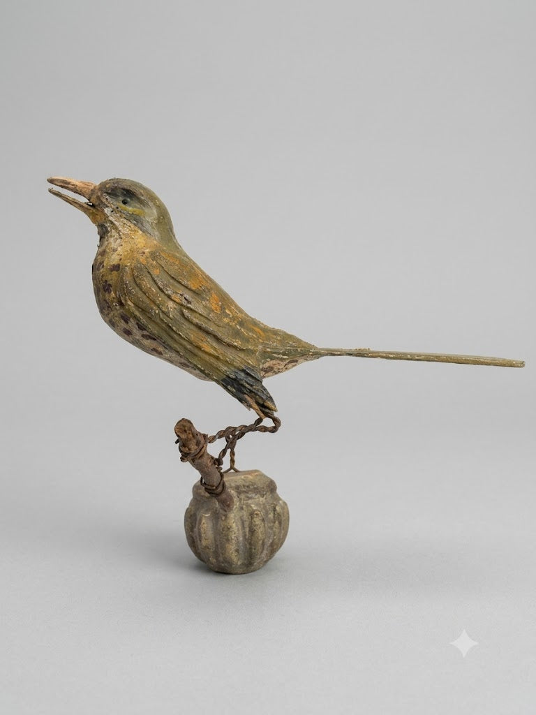 Singende Amsel auf Zweig mit Bleigewicht – Museale Handwerkskunst